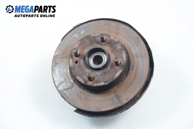 Knuckle hub for Mazda 121 (DB) 1.3 16V, 53 hp, sedan, 1992, position: front - left