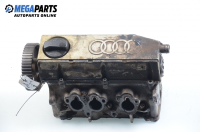 Engine head for Audi A6 (C4) 2.6 Quattro, 150 hp, sedan automatic, 1995