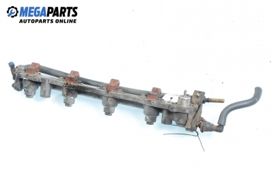 Fuel rail with injectors for Ford Fiesta IV 1.4 16V, 90 hp, 3 doors, 1997