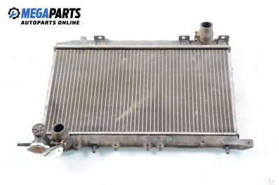 Water radiator for Nissan Almera (N15) 1.4, 87 hp, hatchback, 3 doors, 1996