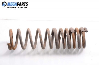 Coil spring for Ford Focus I (1998-2004) 1.6, station wagon, position: rear