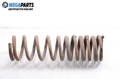 Coil spring for Ford Focus I (1998-2004) 1.6, station wagon, position: rear