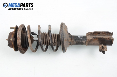 Macpherson shock absorber for Mazda 323 (BA) 1.3, 73 hp, hatchback, 3 doors, 1997, position: front - left