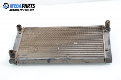 Water radiator for Volkswagen Passat 1.8, 90 hp, station wagon, 1991