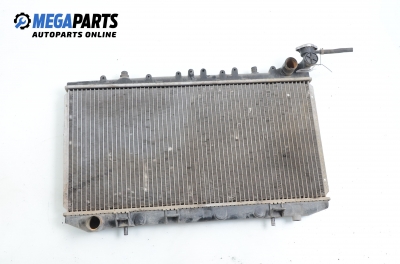 Water radiator for Nissan Sunny (B13, N14) 2.0 D, 75 hp, station wagon, 1992
