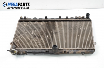 Water radiator for Hyundai Lantra 1.6, 90 hp, station wagon, 1996