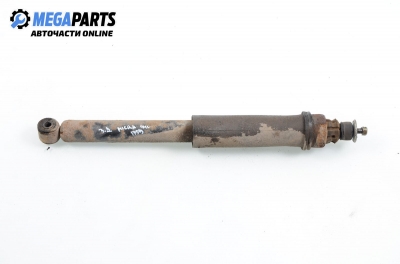 Shock absorber for Nissan Micra 1.3 16V, 75 hp, 3 doors, 1994, position: rear - right