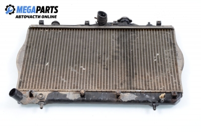 Water radiator for Hyundai Accent 1.3, 75 hp, hatchback, 3 doors, 1996