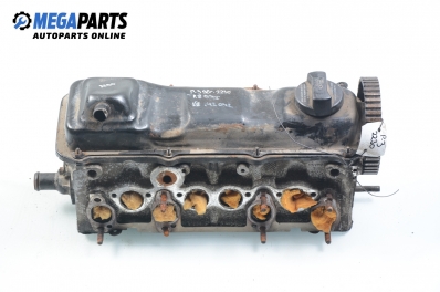 Engine head for Volkswagen Passat (B4) 1.8, 90 hp, station wagon, 1996