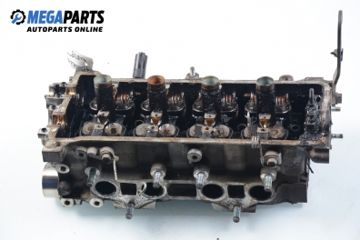 Cylinder head no camshaft included for Toyota Corolla (E110) 1.3, 75 hp, hatchback, 3 doors, 1997