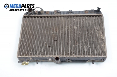 Water radiator for Hyundai Pony 1.3, 58 hp, sedan, 1993