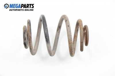 Coil spring for Ford Escort 1.6 16V, 90 hp, station wagon, 1995, position: rear