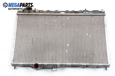 Water radiator for Mitsubishi Lancer 1.6, 90 hp, hatchback, 5 doors, 1991