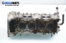 Engine head for Nissan Almera (N15) 1.4, 87 hp, sedan, 1998