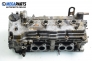 Cylinder head no camshaft included for Nissan Almera Tino 1.8, 114 hp, 2001