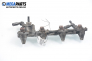 Fuel rail with injectors for Ford Mondeo Mk II 2.0, 131 hp, sedan, 1997